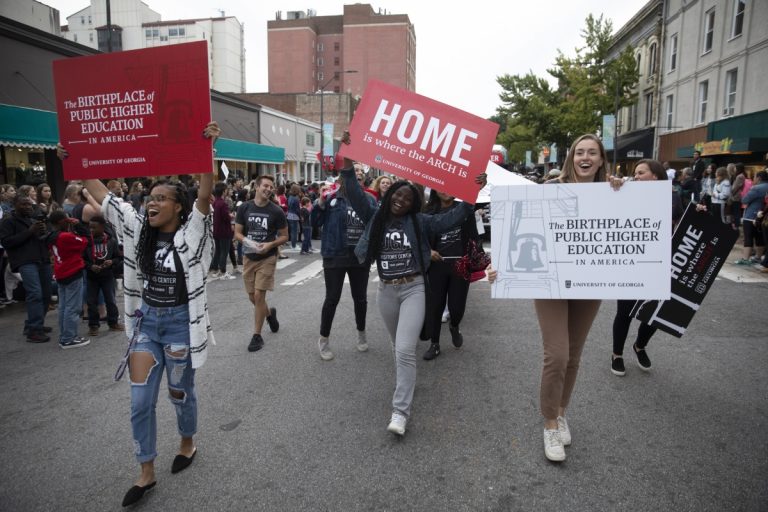 Students marching in the Homecoming parade