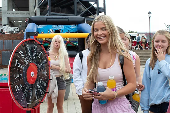 Students with a Roulette Wheel.